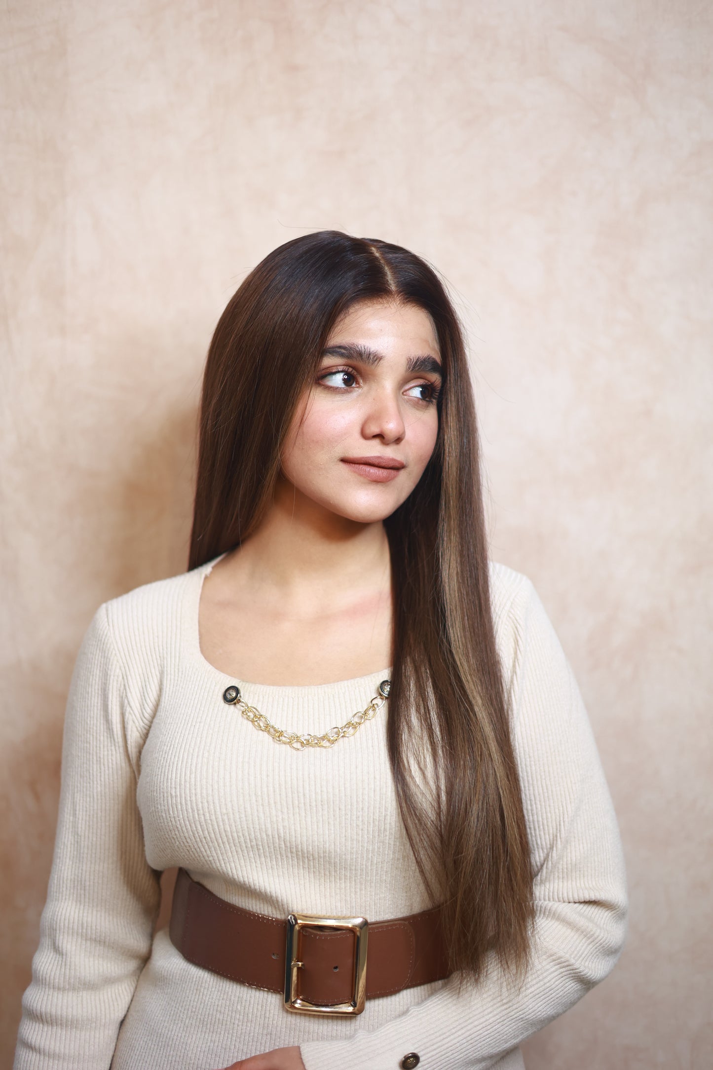 Model wearing COCO straight brown human hair wig with highlights, HD lace, glueless and clipless design, free parting, and breathable construction for all-day comfort