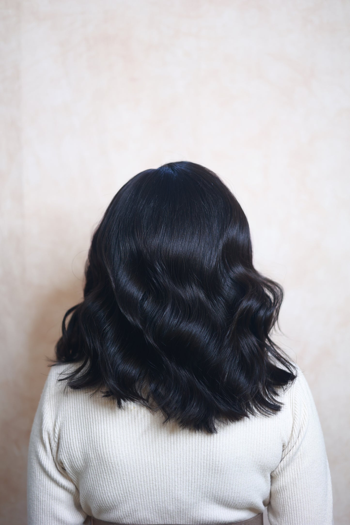 Model wearing NYSA 14-inch wavy bob wig in natural black, with HD lace, glueless and clipless design, free parting, and breathable construction for all-day comfort; also suitable for alopecia