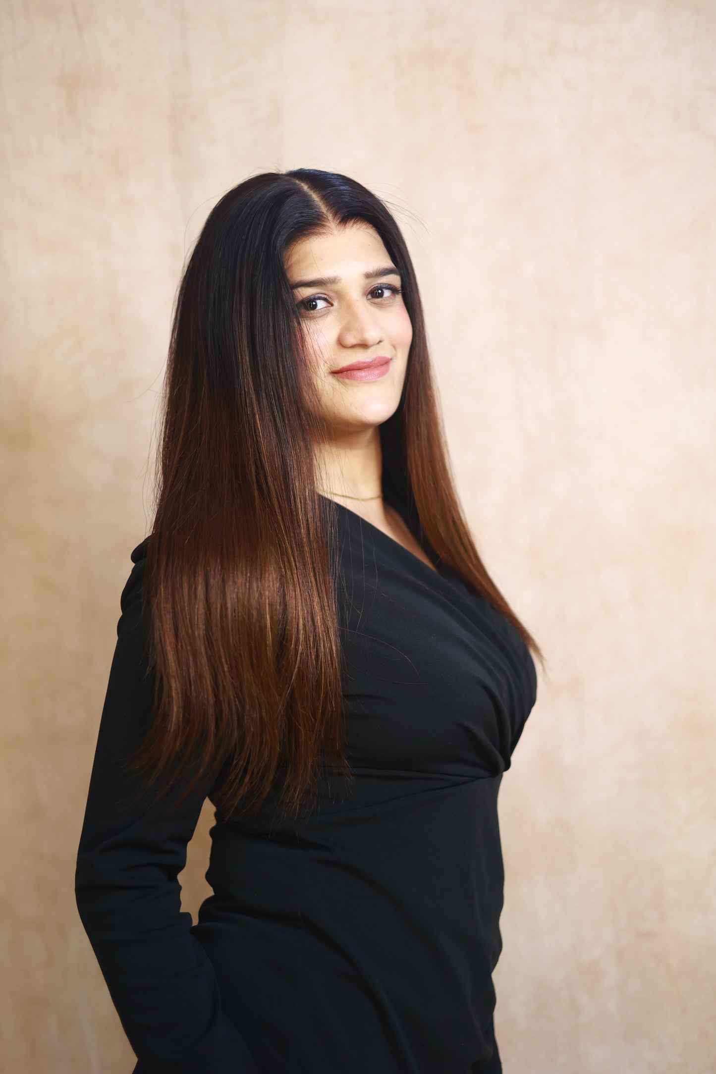 Model wearing HAZEL straight chocolate brown human hair wig with HD lace, glueless and clipless design, free parting, and breathable construction for all-day comfort; also great for medical use