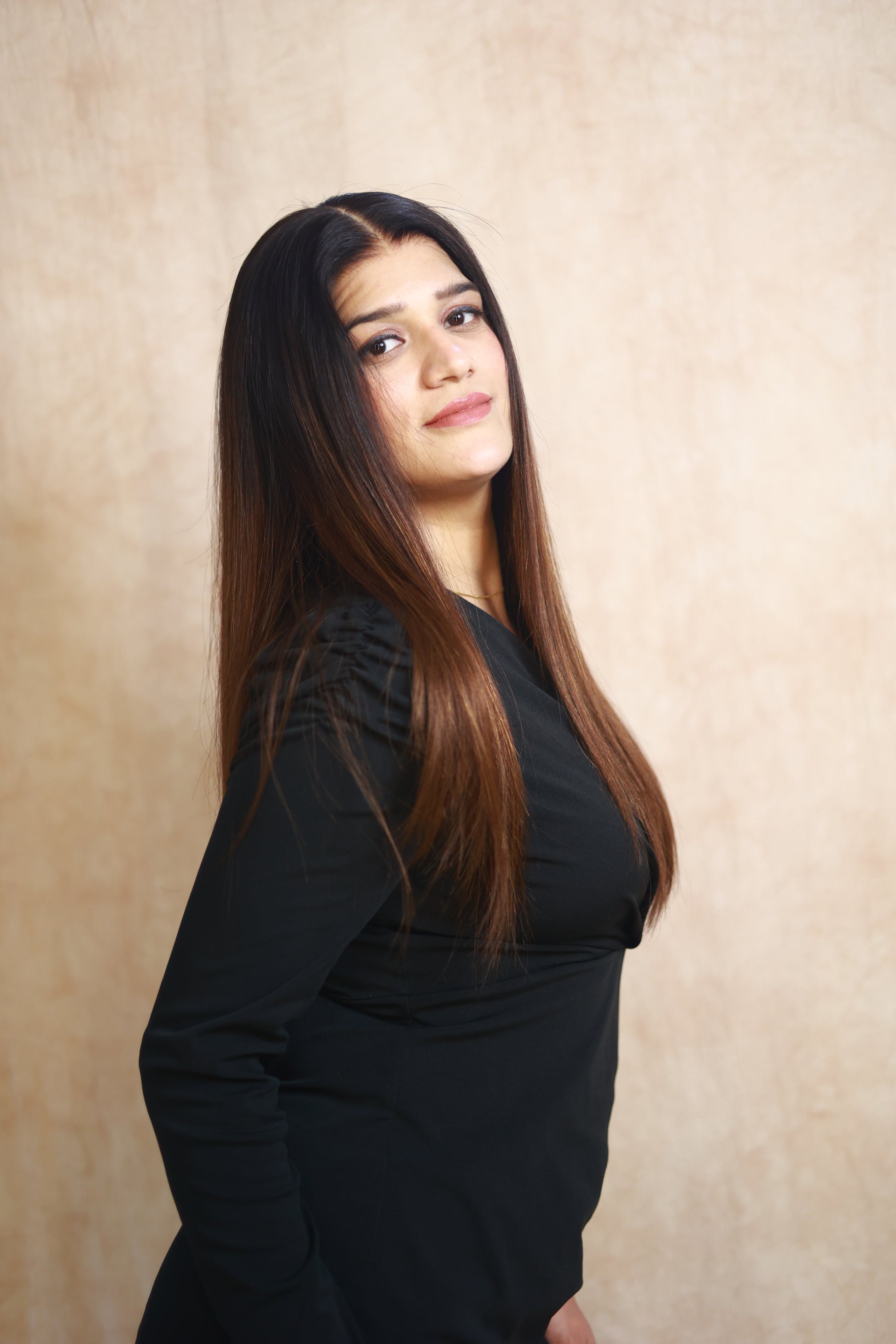 Model wearing HAZEL straight chocolate brown human hair wig with HD lace, glueless and clipless design, free parting, and breathable construction for all-day comfort; also great for medical use