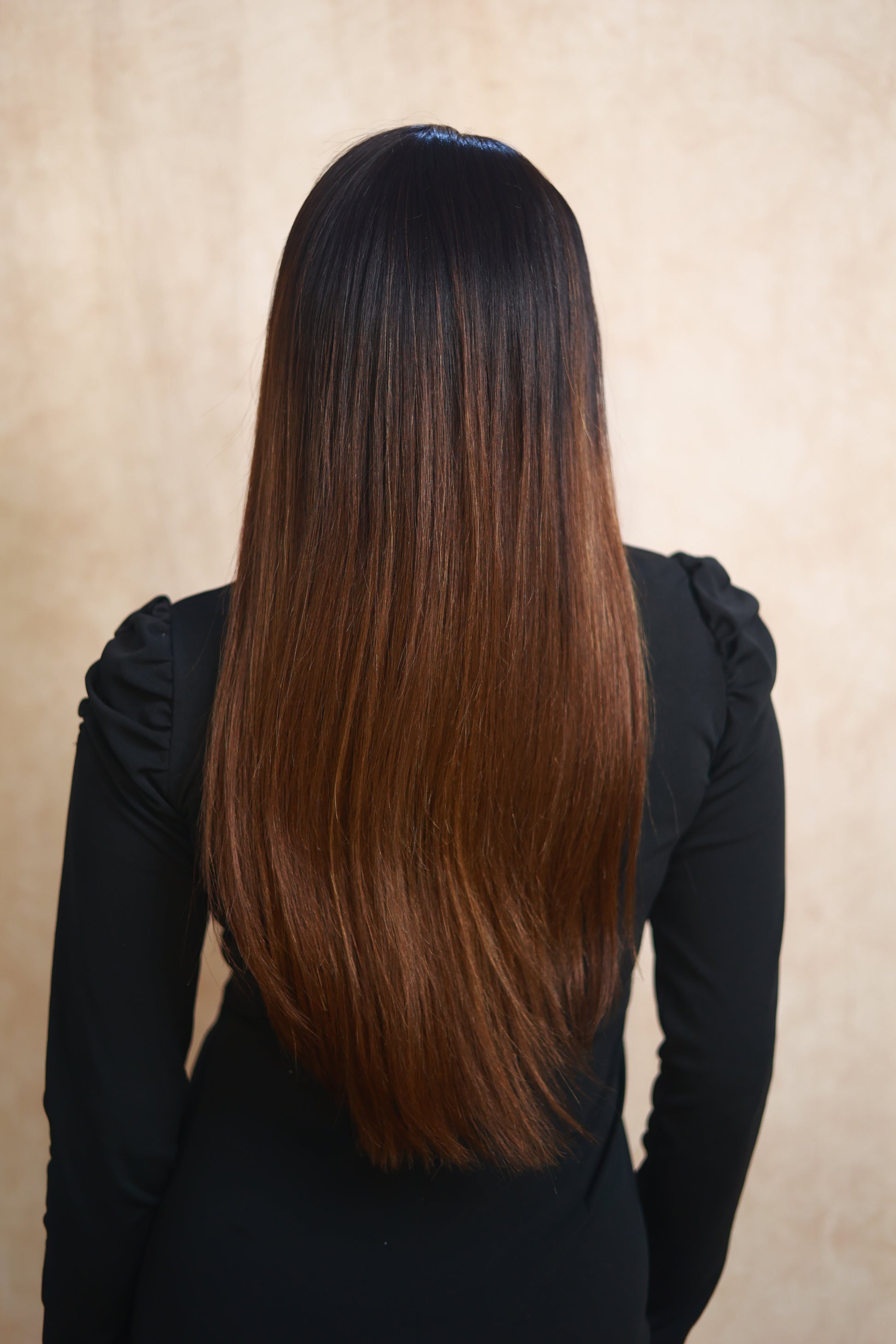 Model wearing HAZEL straight chocolate brown human hair wig with HD lace, glueless and clipless design, free parting, and breathable construction for all-day comfort; also great for medical use