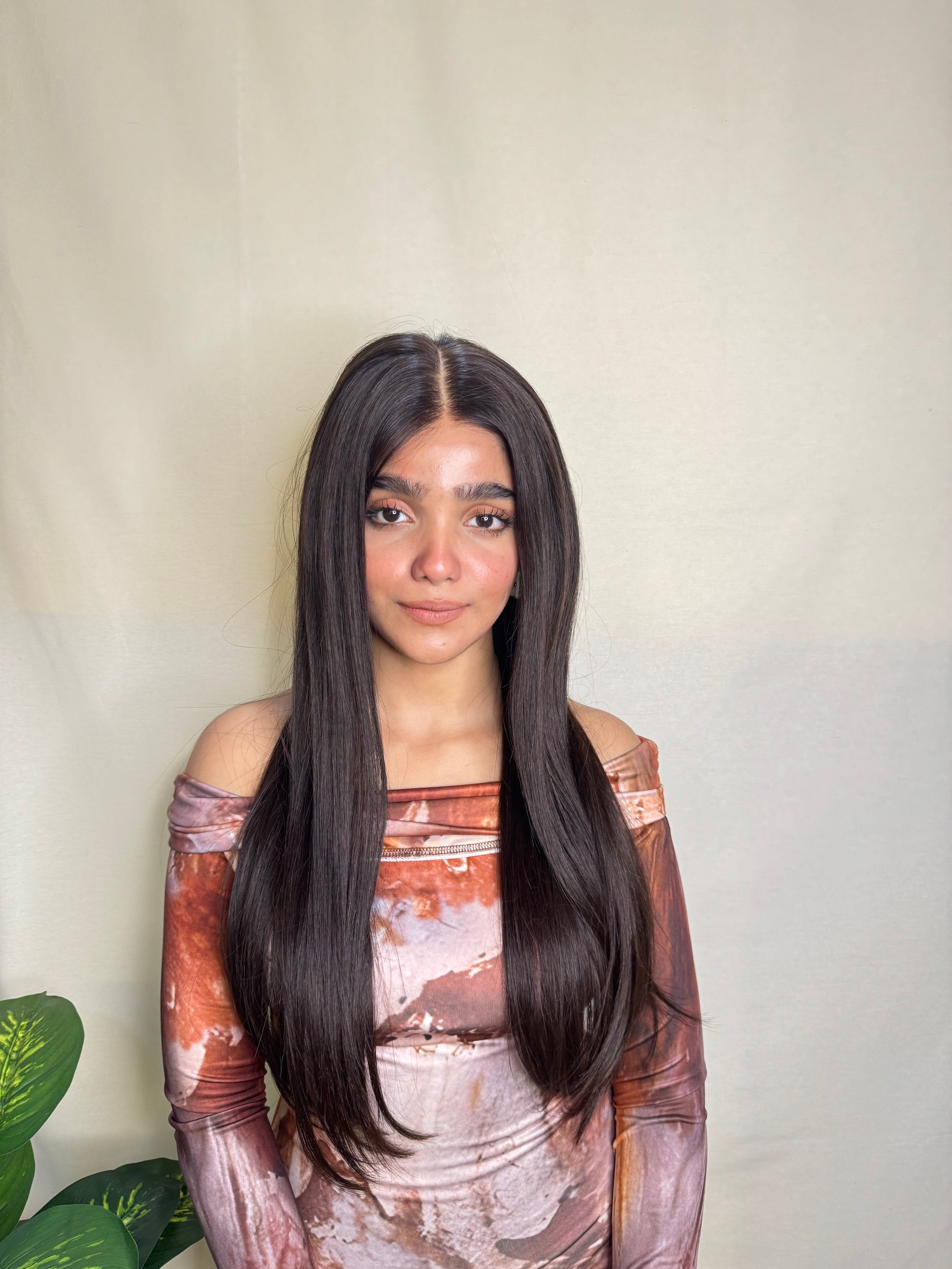 Long straight wig in natural black-brown with HD lace and glueless design.